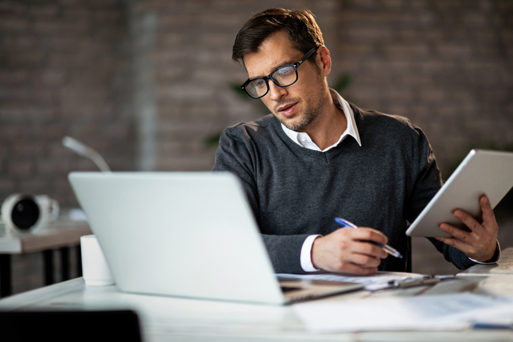 Businessman working at home using Microsoft Teams