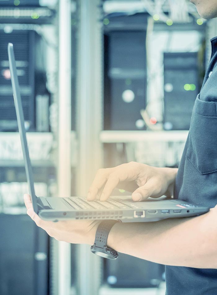 male working on laptop computer