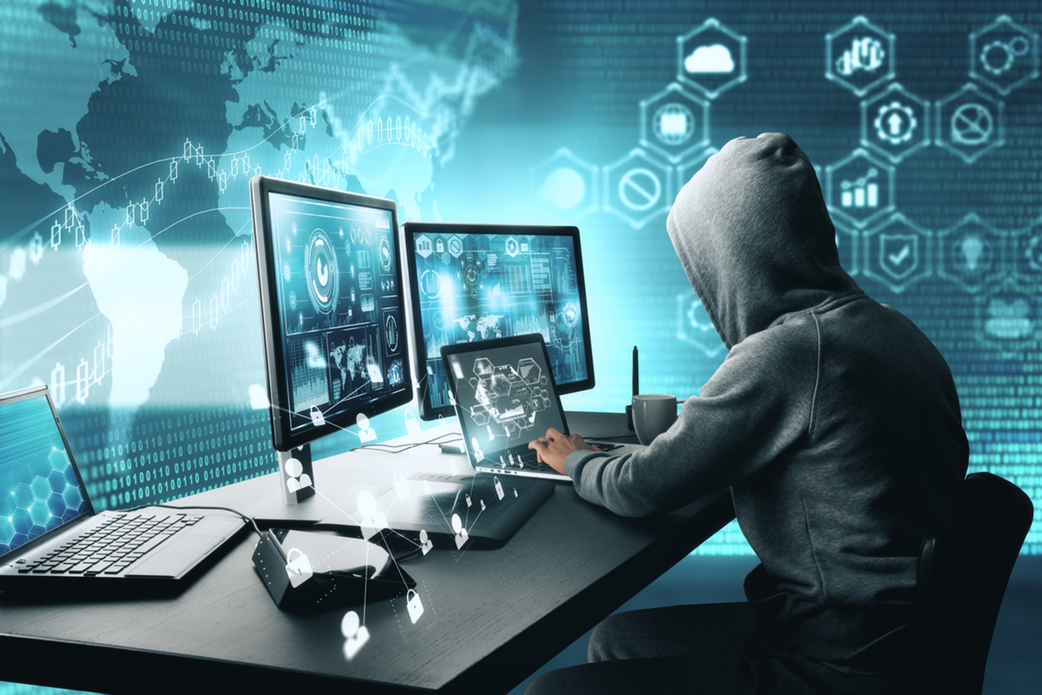 internet hacker at computer desk
