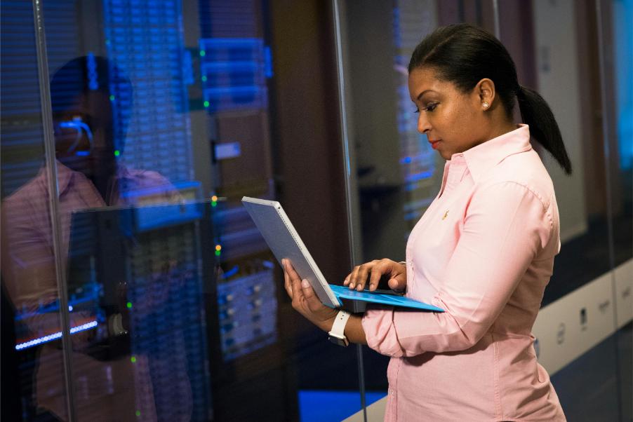 IT technician restoring files from an offsite backup after system failure
