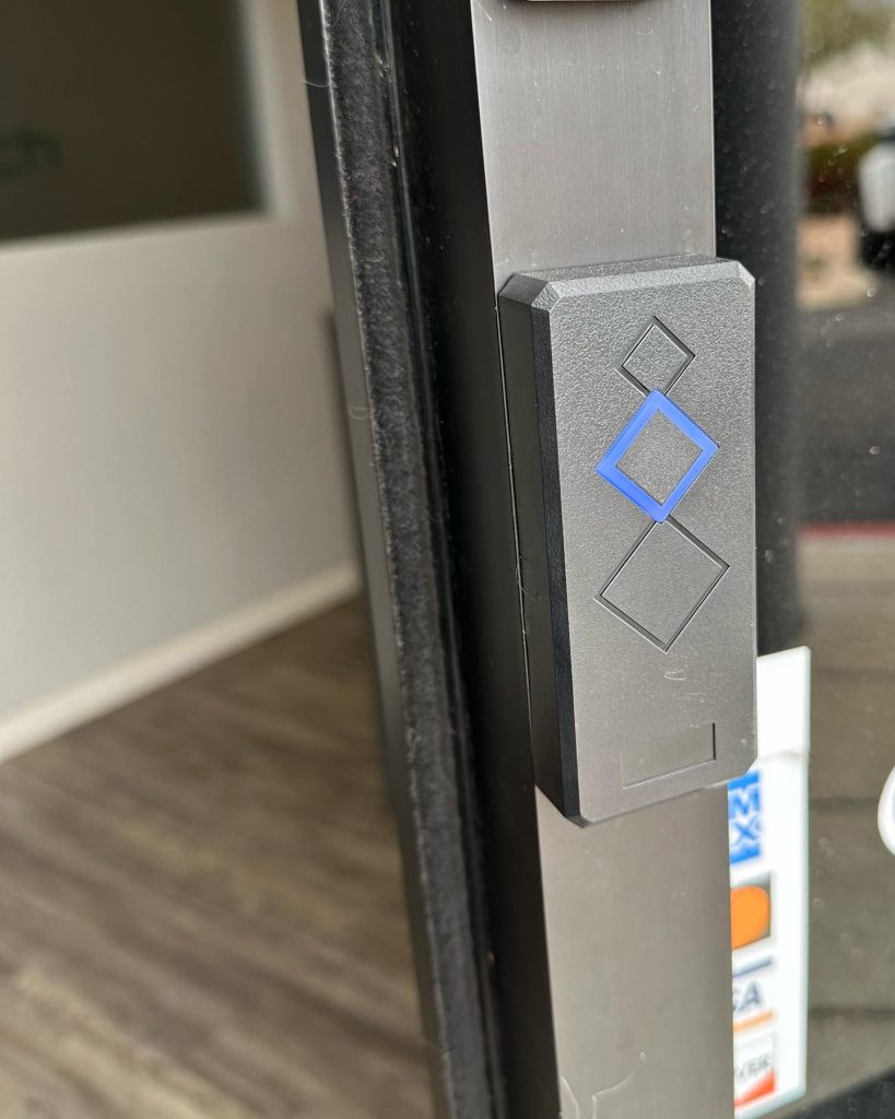 Commercial access control system with keycard reader at office door
